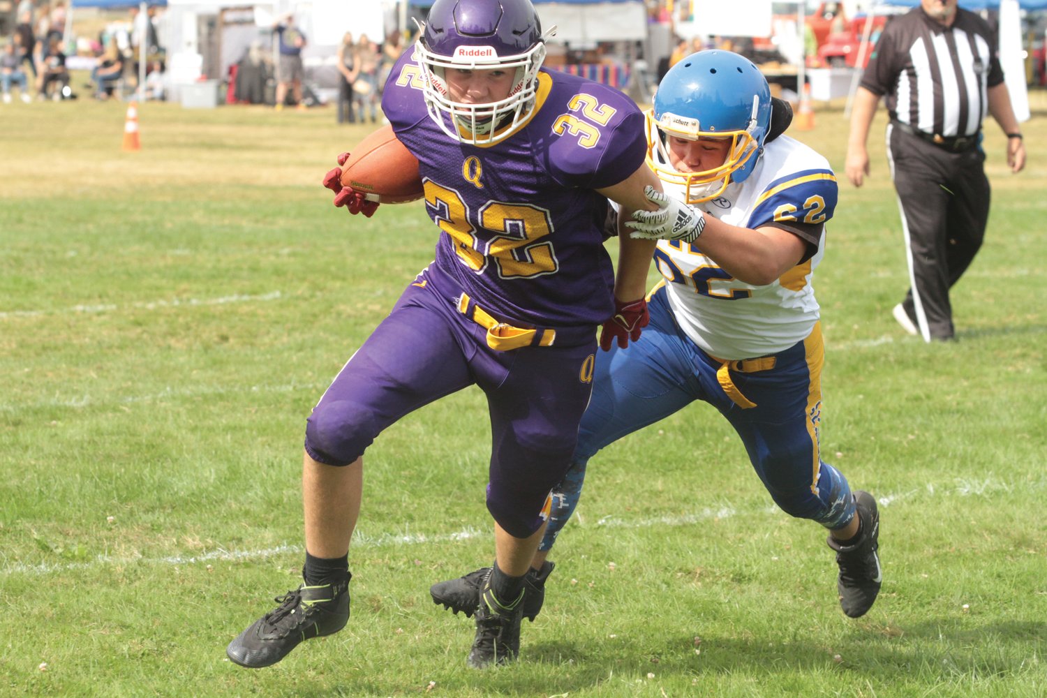 Mason Iverson breaks free during the first half in Quilcene’s 1B football matchup against Crescent